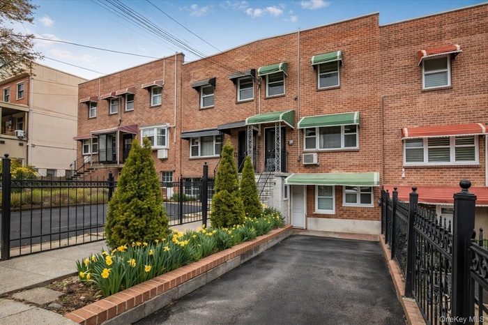 View of front of house featuring brick siding