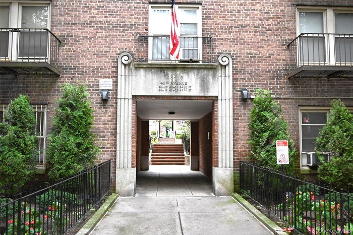 Property entrance with brick siding.