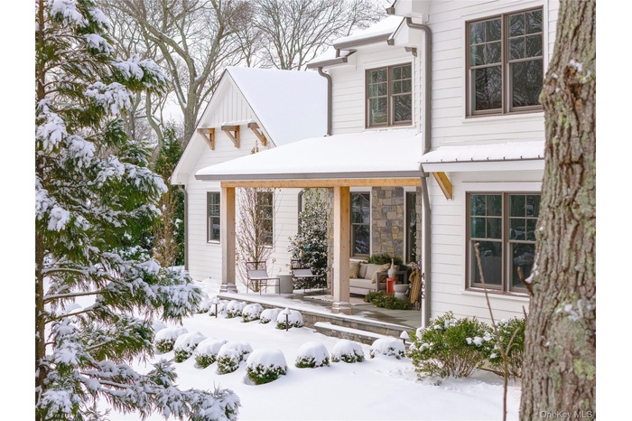 New Construction Farmhouse in snow