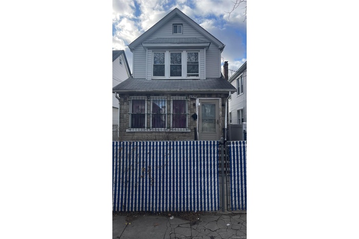 View of front of home featuring stone siding