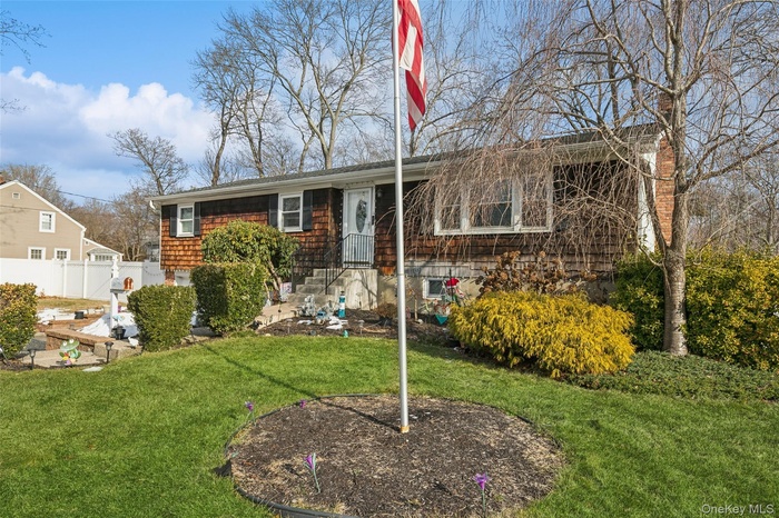 View of front facade with a chimney