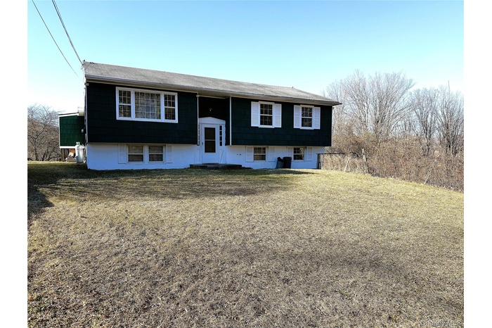 LOTS OF SPACE IN THIS HOME!  4 BEDROOMS, ONE FULL and ONE HALF BATH.