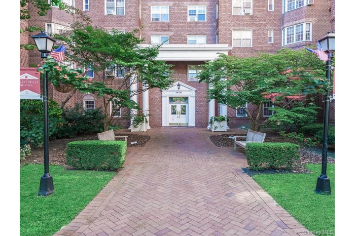 Building entry beautifully landscaped