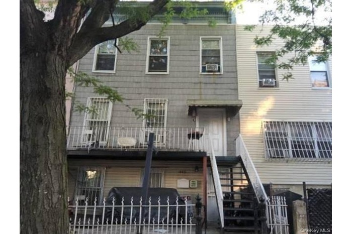 View of front of property featuring stairway