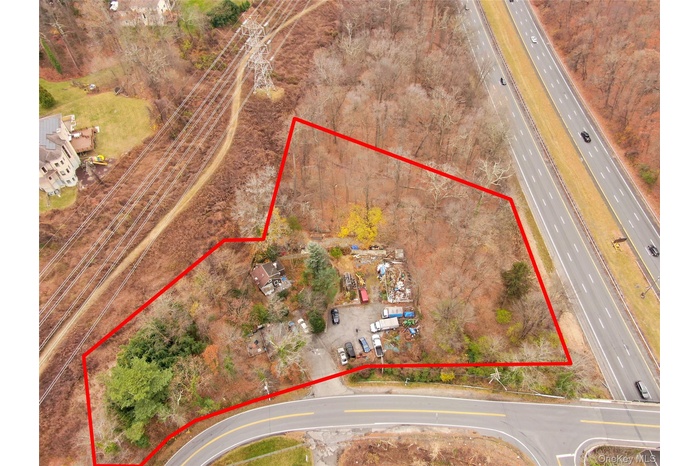View of property location featuring a major roadway and property parcel outlined