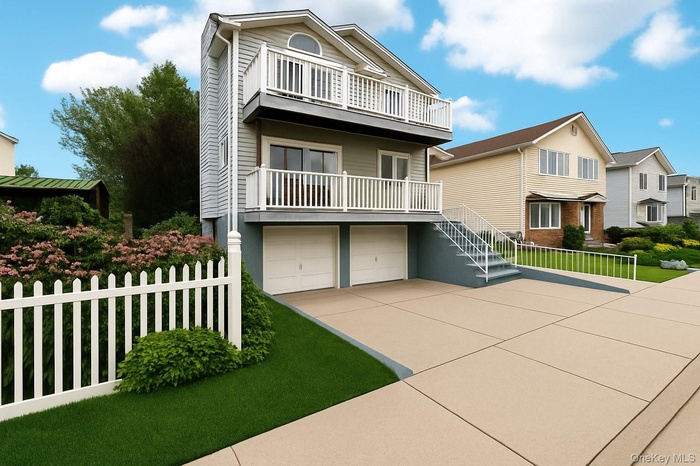 View of front facade featuring concrete driveway, a garage, and a balcony