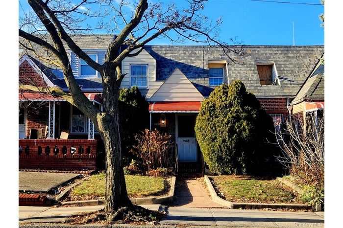 Brick One-Family with Covered Porch and Front Garden