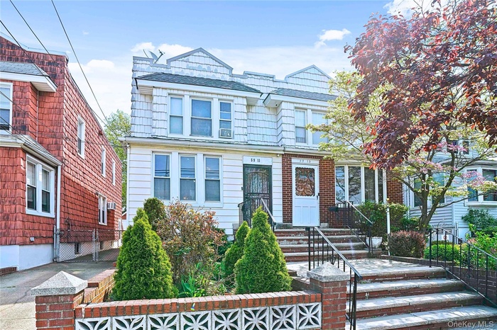 View of front of house with a fenced front yard