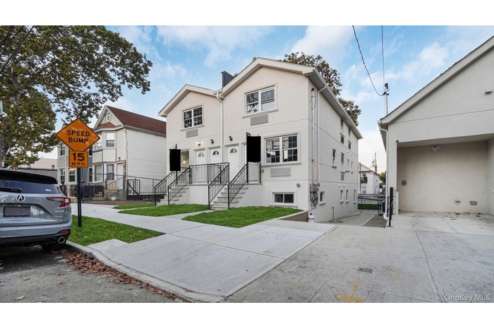 View of front of property with stucco siding