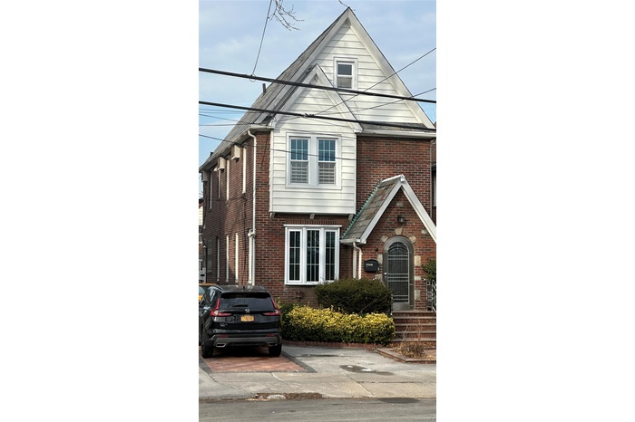 View of front facade with brick siding