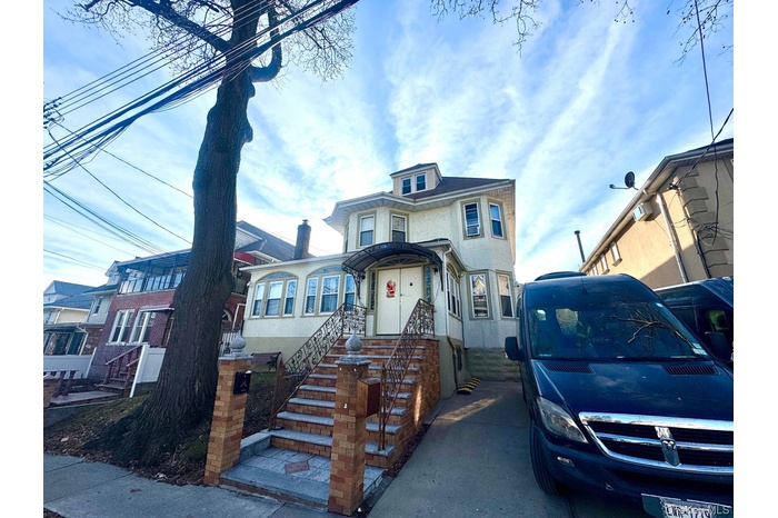 View of front facade with stucco siding