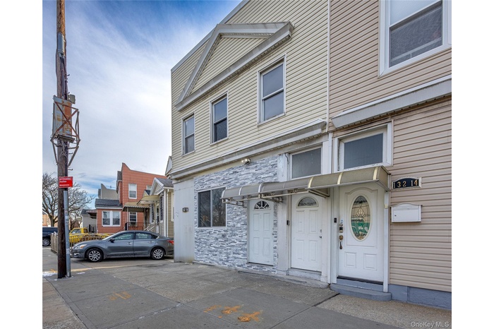 View of front of home with stone siding