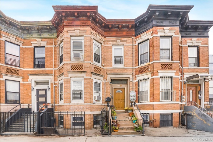 Italianate house featuring brick siding