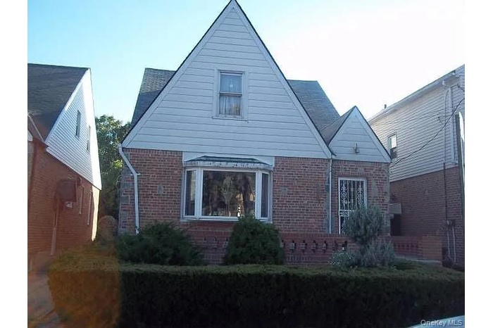 View of home's exterior with brick siding