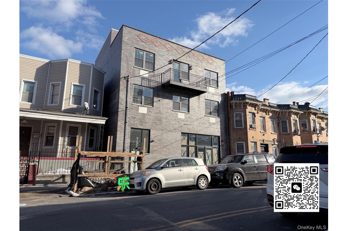 View of front of property with brick siding