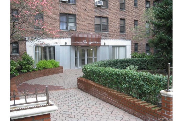 View of property with cooling unit