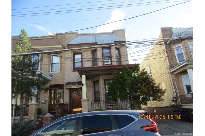 View of front of home with brick siding