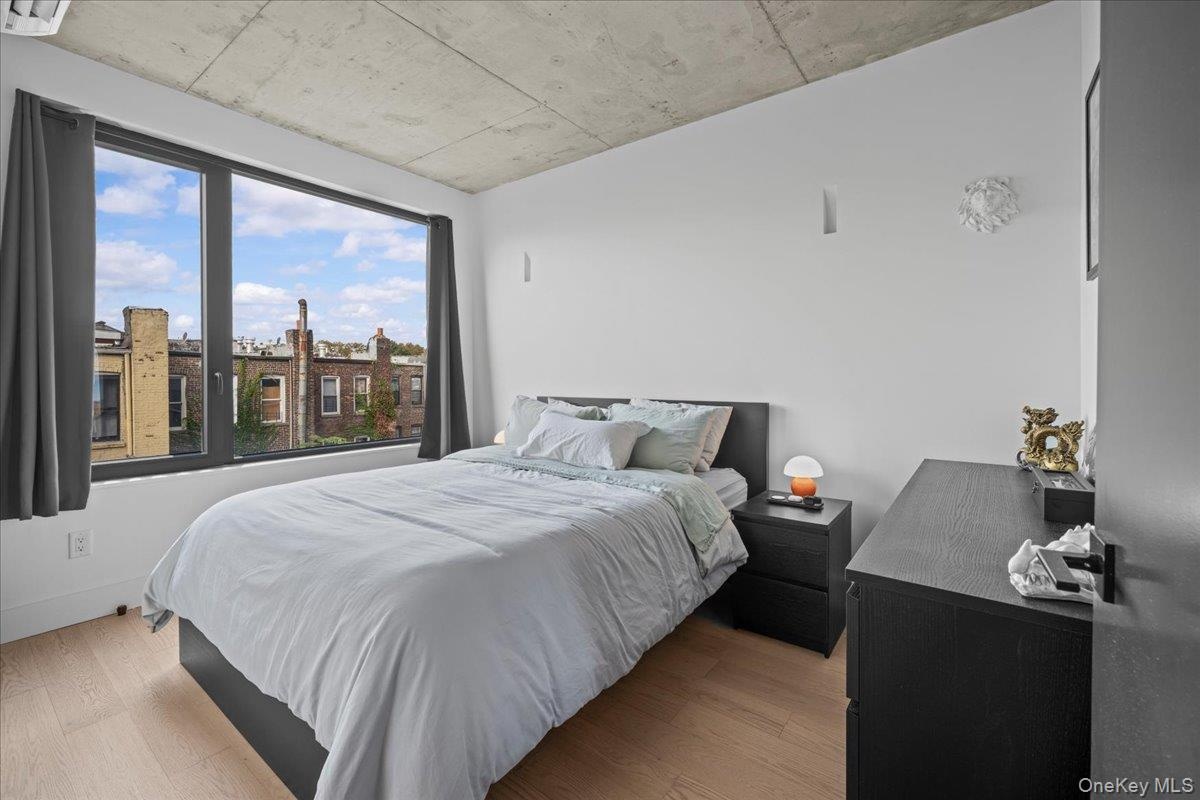 Bedroom featuring wood finished floors