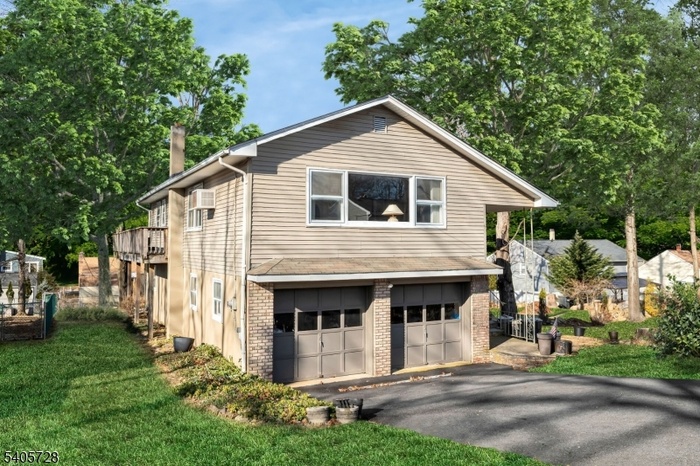 RAISED RANCH IN LAKE COMMUNITY