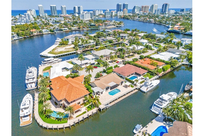 Aerial view of home facing southeast with the mouth of Middle River & Intracoastal in background