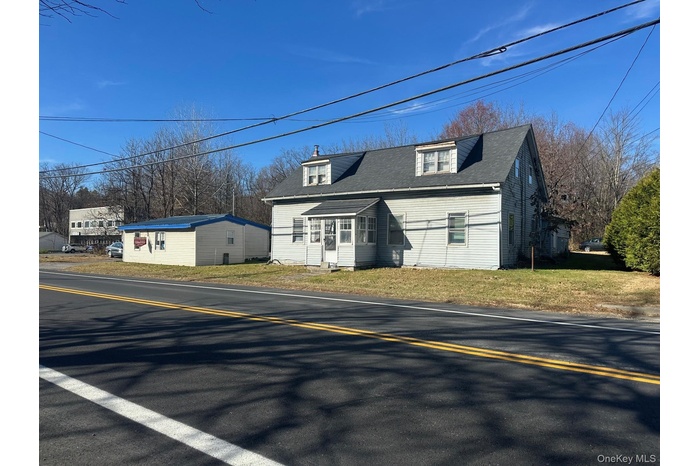 View of front of house and additional building
