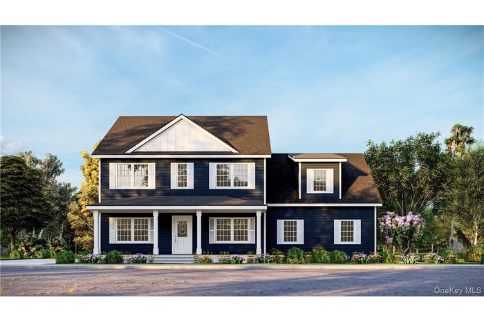 Colonial house featuring covered porch