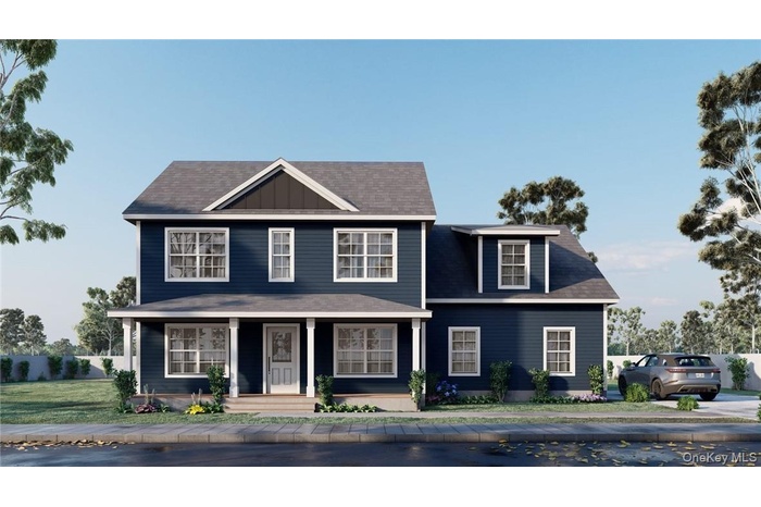 View of front of property featuring a front lawn and covered porch