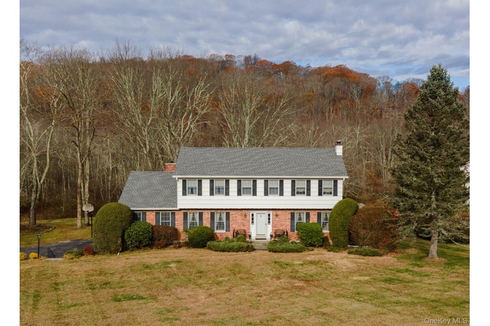 A traditional Colonial in Indian Hill, only minutes to Metro North, shops, park and I-684.