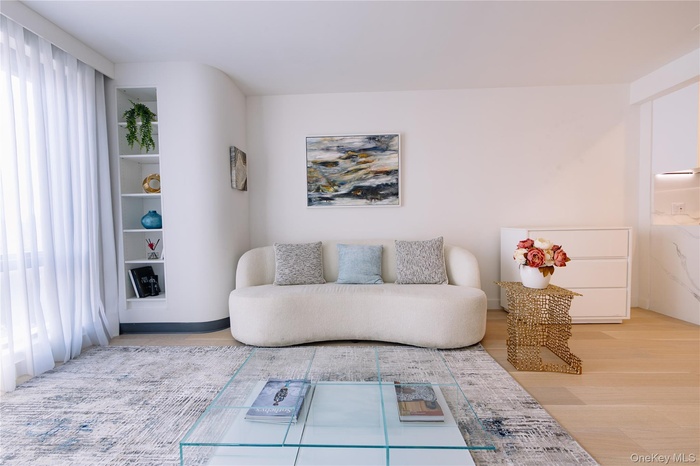 Sitting room with light wood finished floors