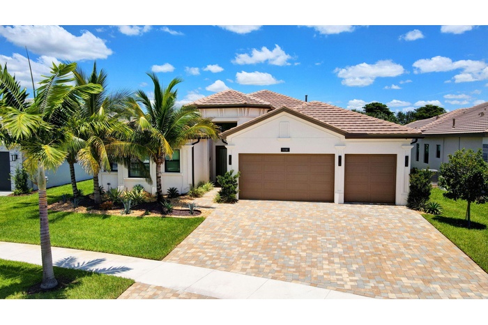 Luxurious Wide Charleston Grand House showcasing 3 straight-in garages and spacious driveway