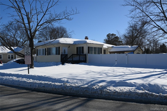 Corner lot. 3/4 sides of block is fenced.