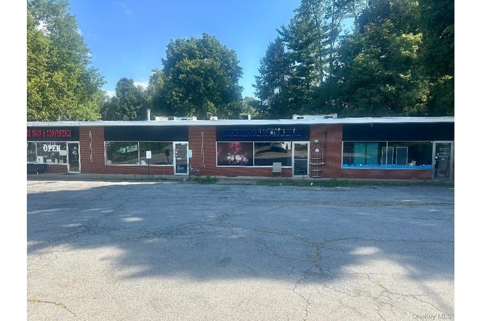 View of front of property with brick siding