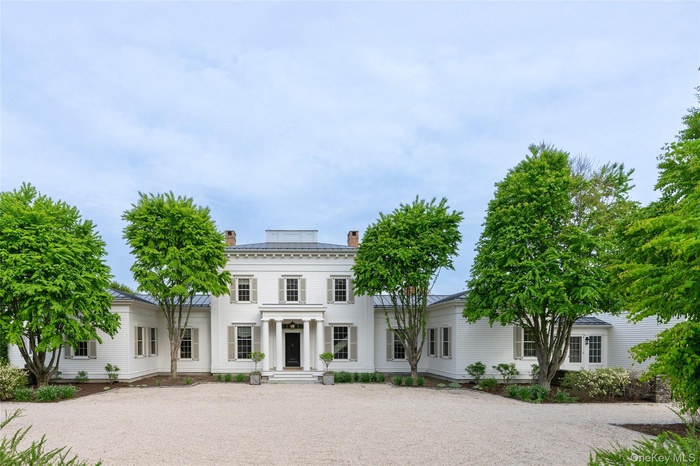View of front of home with a chimney