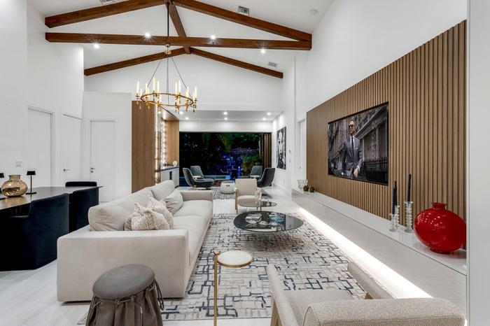 Statement great room with custom media wall and entertainer’s layout.