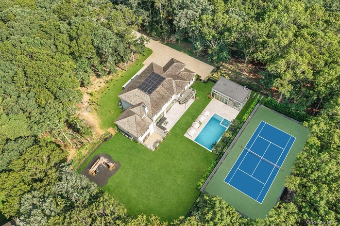 Aerial View of New Construction With Pool,  Pool House and Tennis