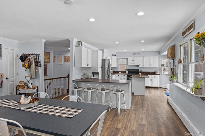 Open floor plan that connects kitchen, dining, and living areas for effortless hosting.