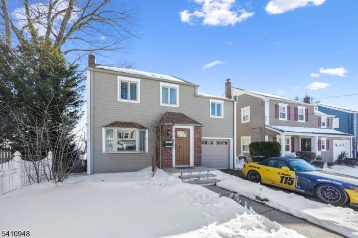 Includes garage and driveway