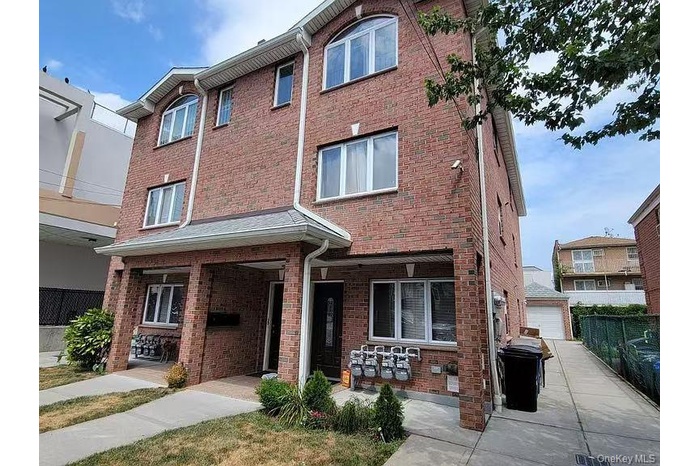 View of front of home with brick siding