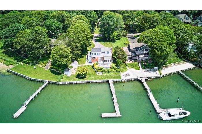 Aerial view of property's location featuring a nearby body of water