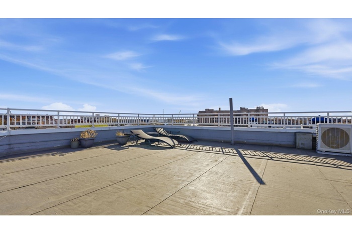 View of patio / terrace featuring a water view