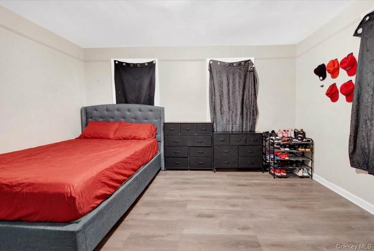 Bedroom featuring wood finished floors