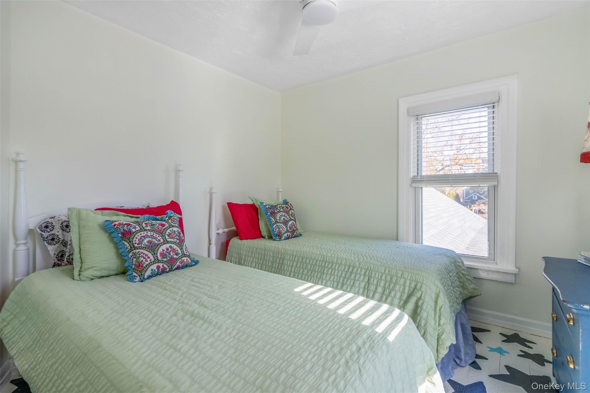 Bedroom with baseboards and ceiling fan