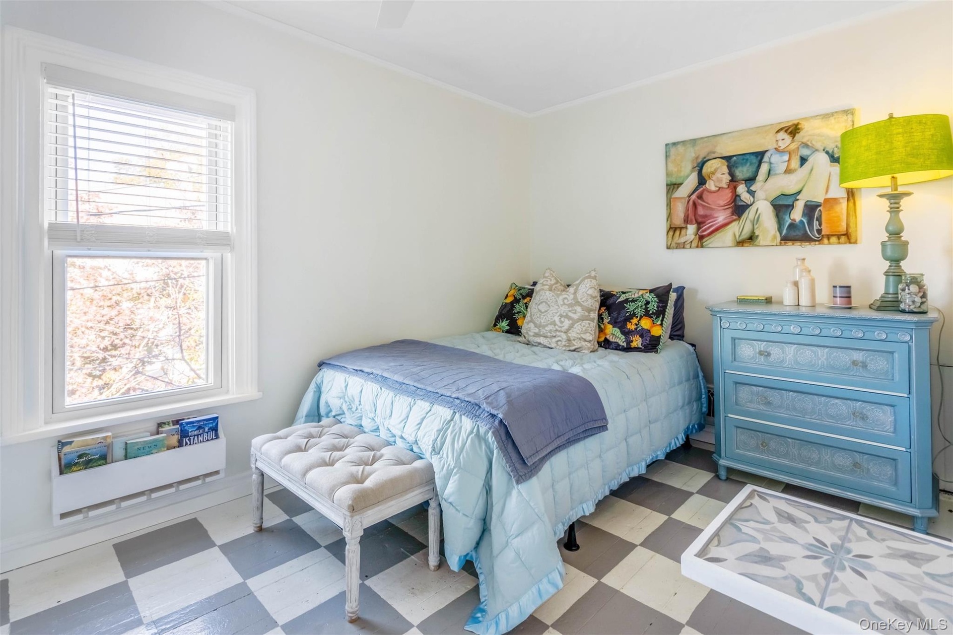 Bedroom featuring tile patterned floors, ceiling fan, and ornamental molding