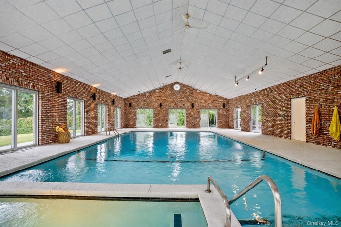 Pool with Diving Board pool is 42'x26' the depth is 3'-12' with sliding doors to courtyard and backyard