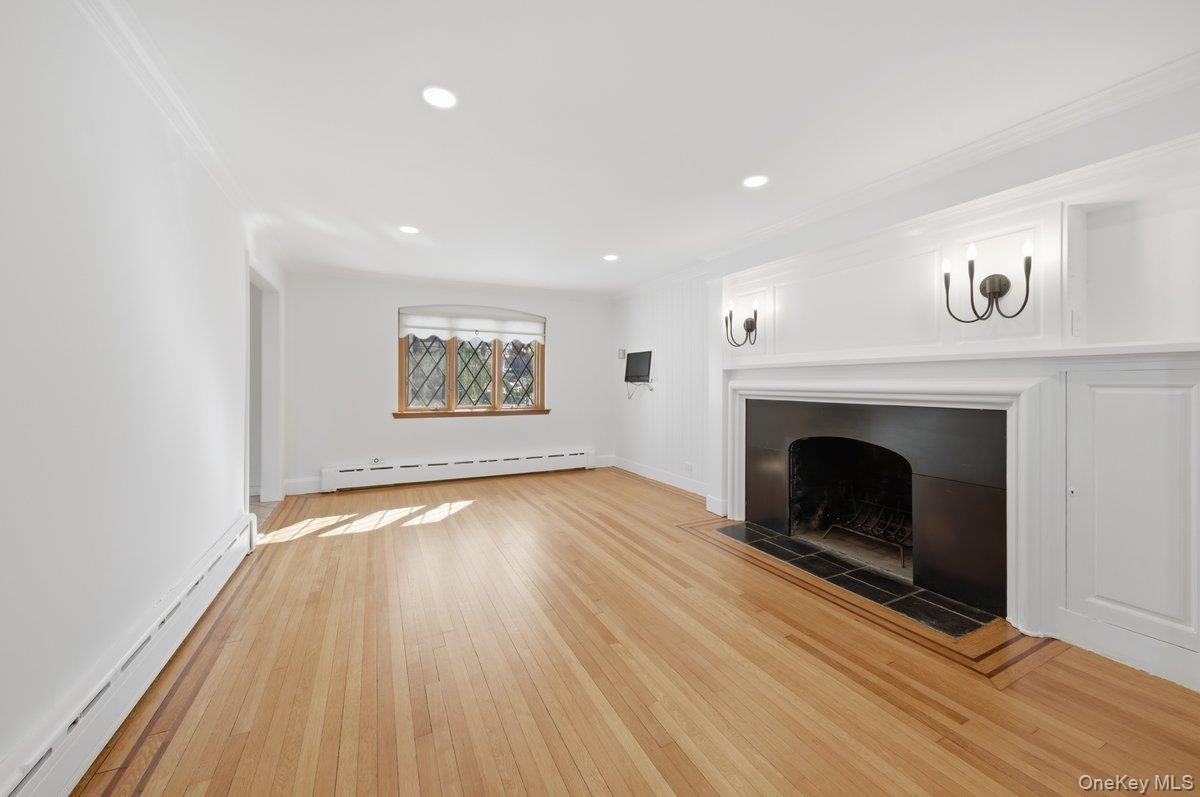 Wood Fireplace, Refinished original oak hardwood flooring