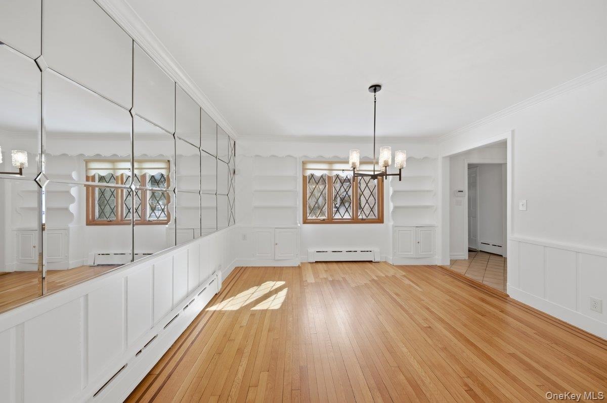 Refinished original oak hardwood flooring, Diamond paned Pella windows