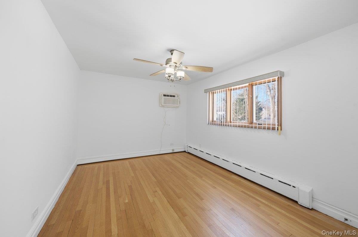 3rd Bedroom, freshly painted, ceiling fan, traditional closet preserving vintage character