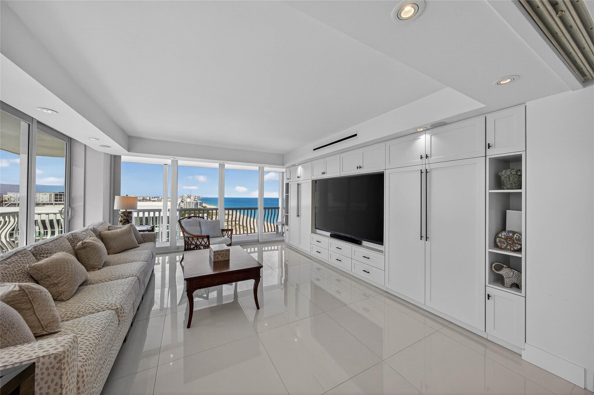 Wall Unit In Family Room With Two Hidden Single Size Murphy Beds