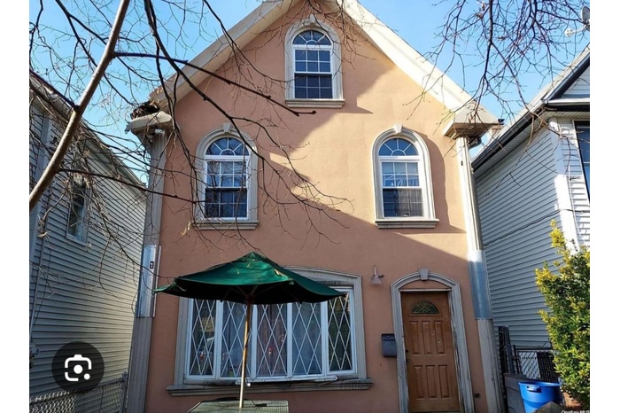 View of front of property with stucco siding
