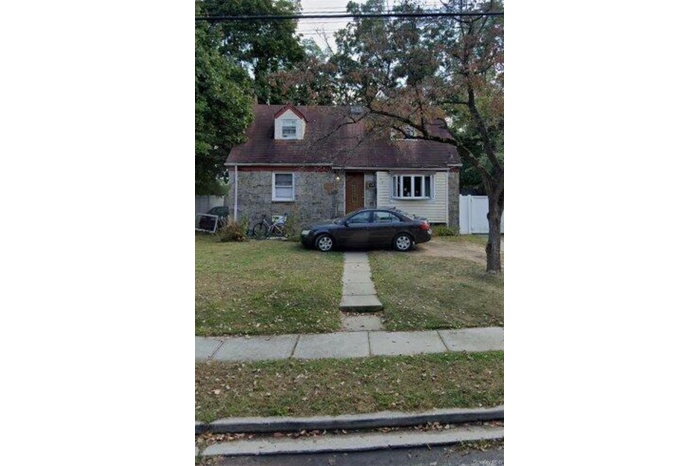 View of front of property with stone siding